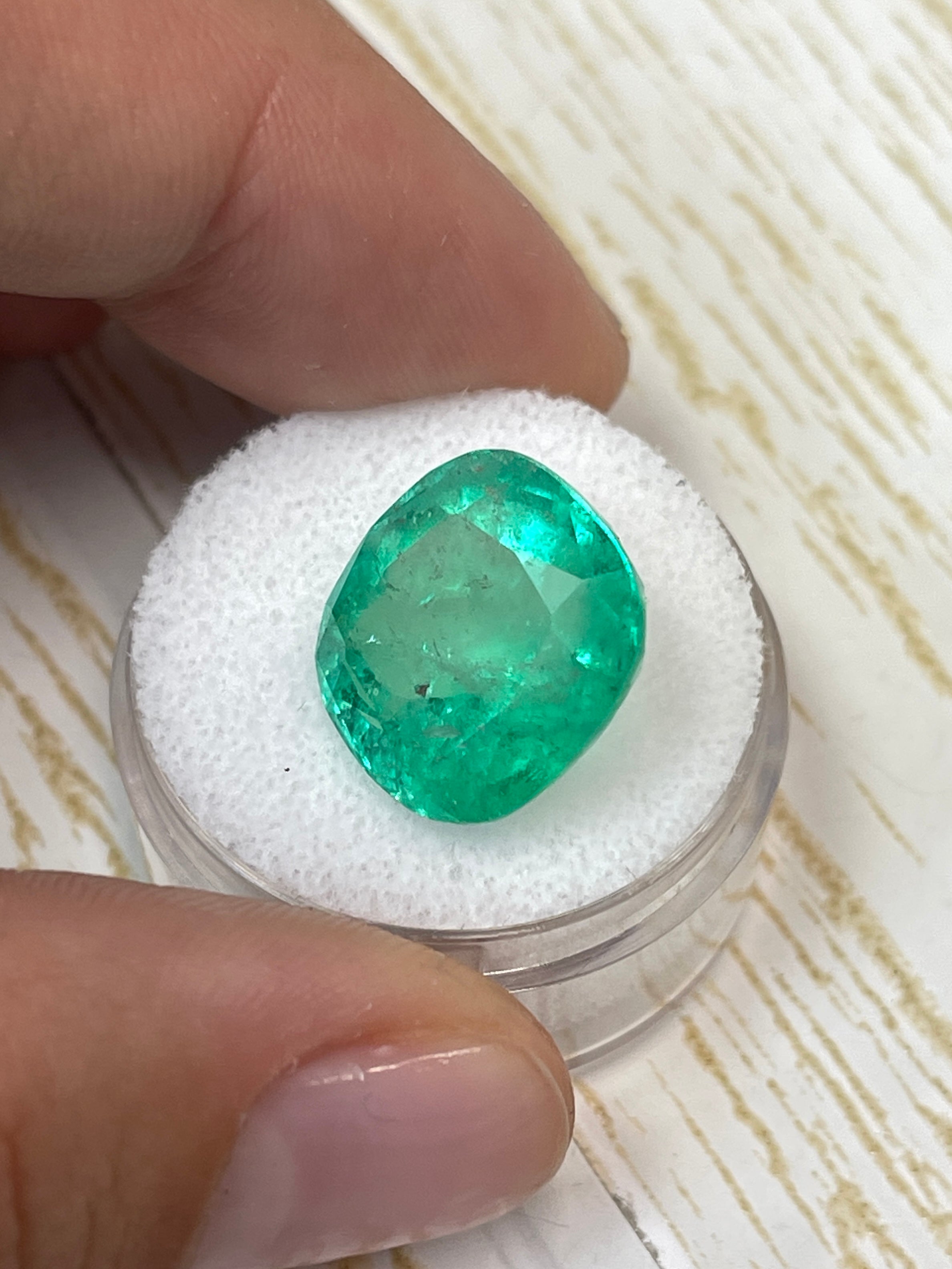 Large 13.63 carat medium green Colombian emerald loose cushion cut gemstone from JR Colombian Emeralds.