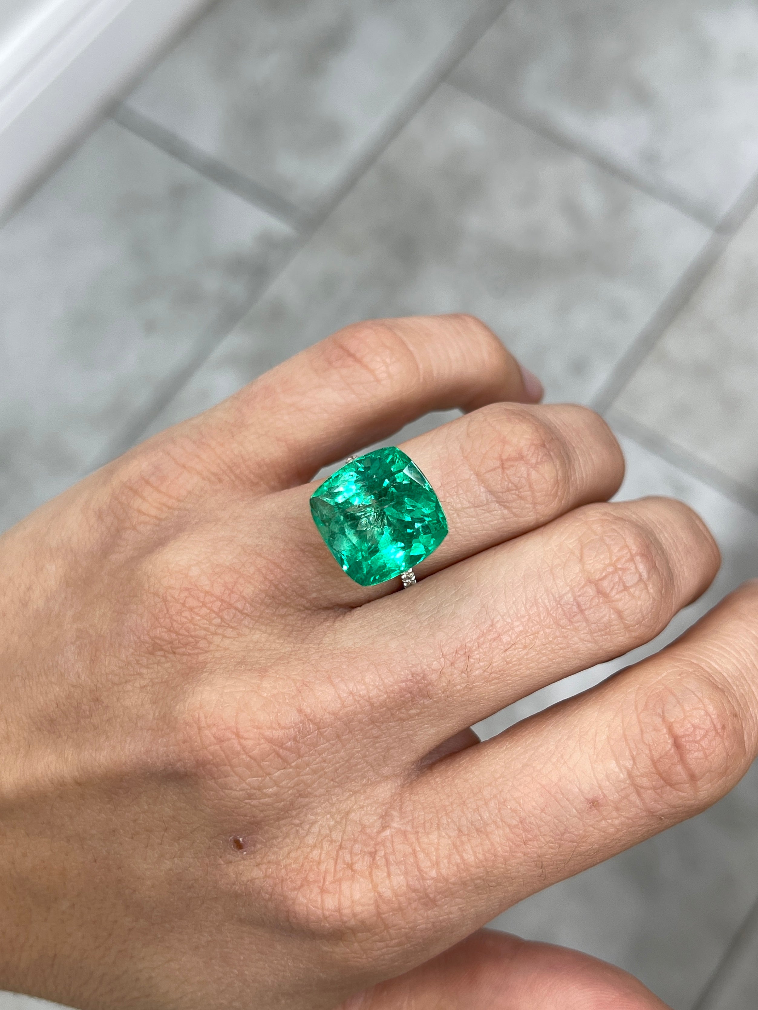 Large 13.88-carat bluish green cushion cut Colombian emerald, ethically mined, loose gemstone by JR Colombian Emeralds.
