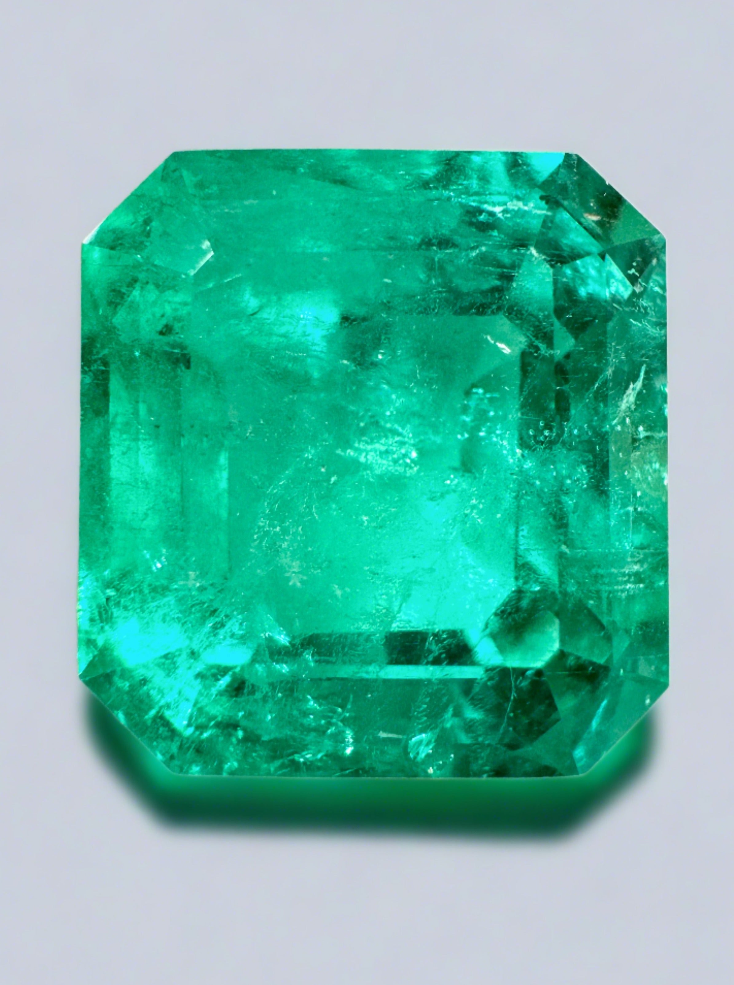 Large 15.28-carat Colombian emerald loose gemstone with GIA certificate, emerald cut, from JR Colombian Emeralds.
