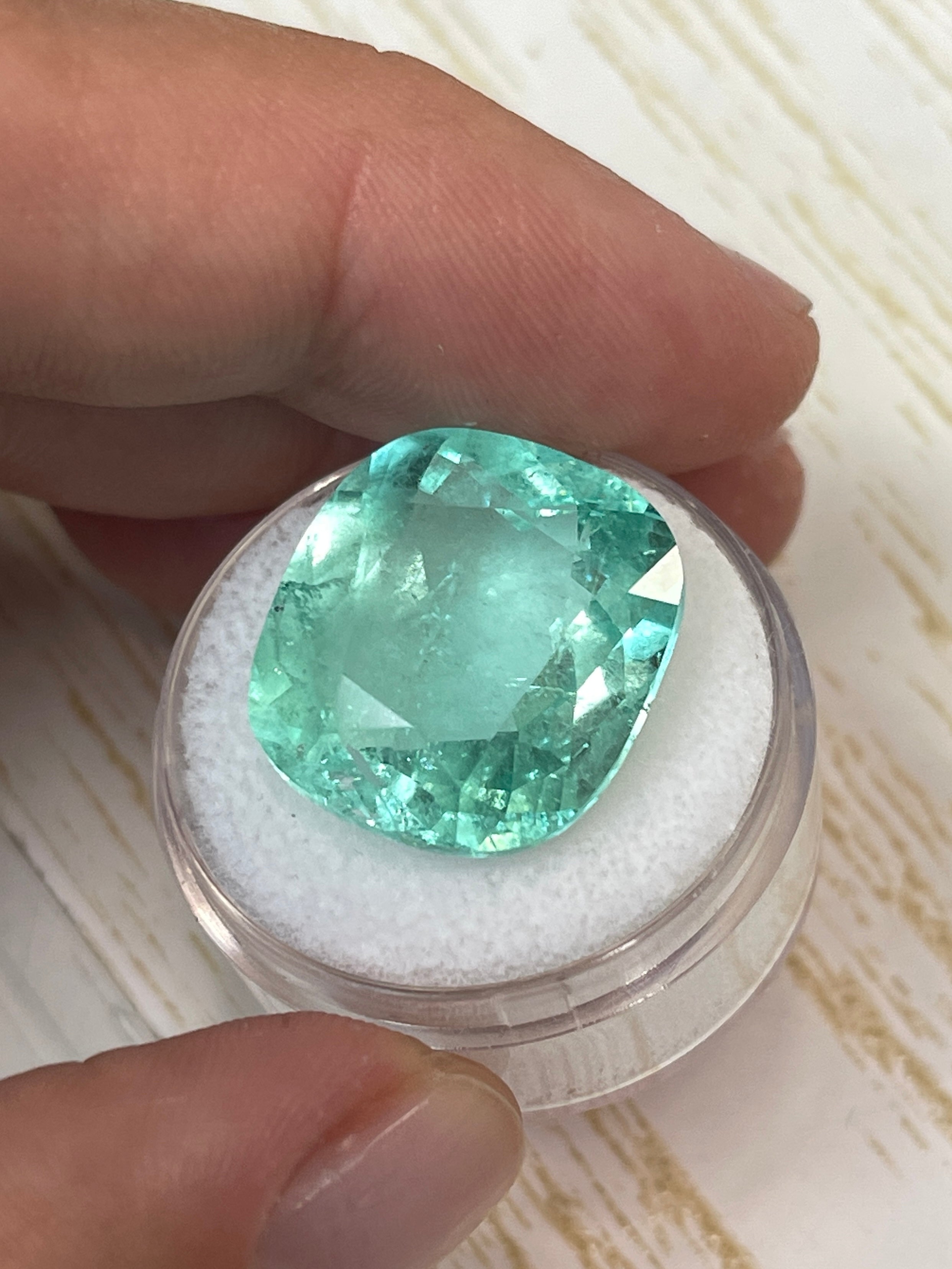 Large 19.41 carat pastel green Colombian emerald loose cushion cut gemstone from JR Colombian Emeralds.