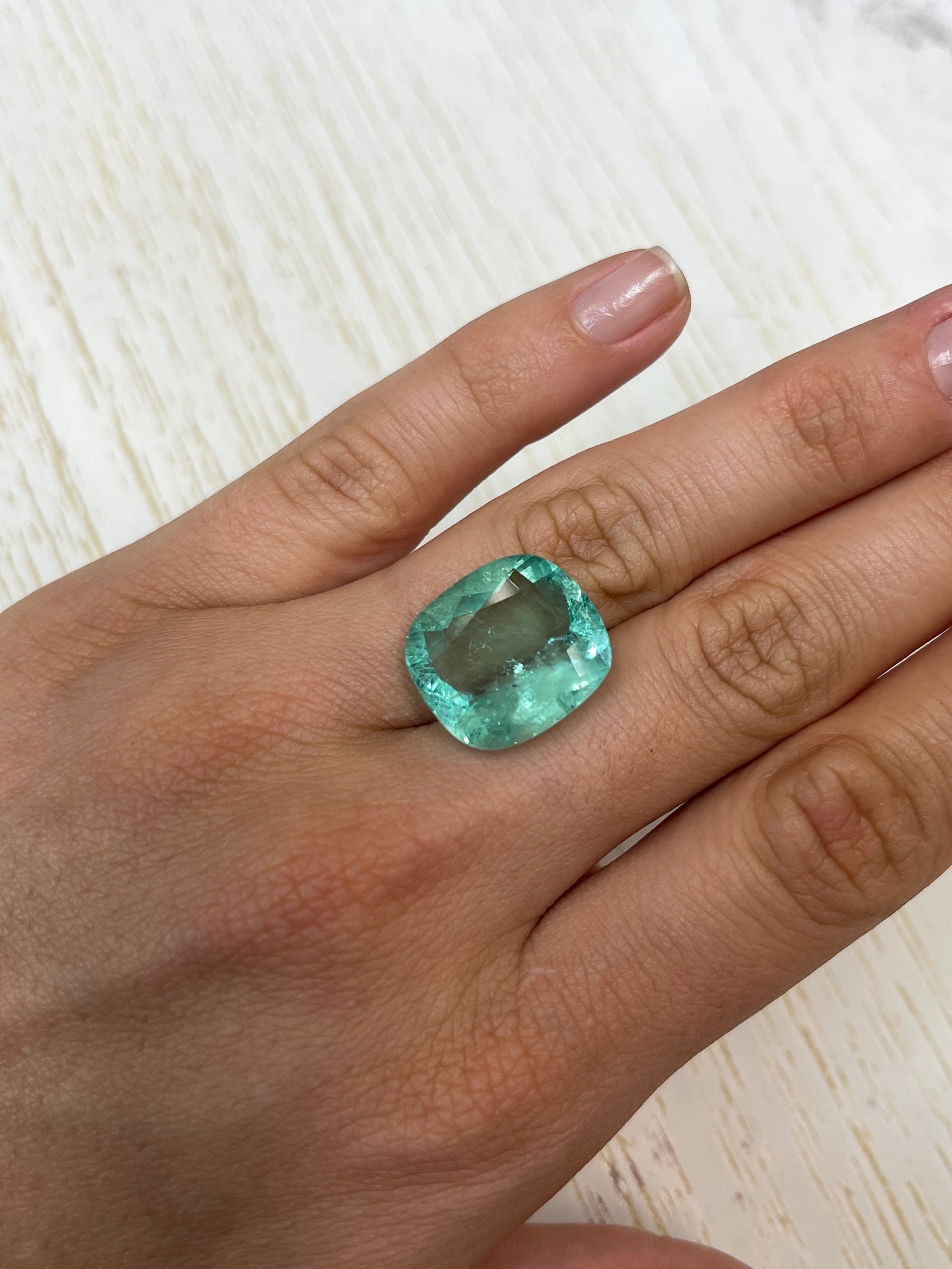 Large 19.41 carat VS pastel green Colombian emerald loose cushion cut gemstone by JR Colombian Emeralds.
