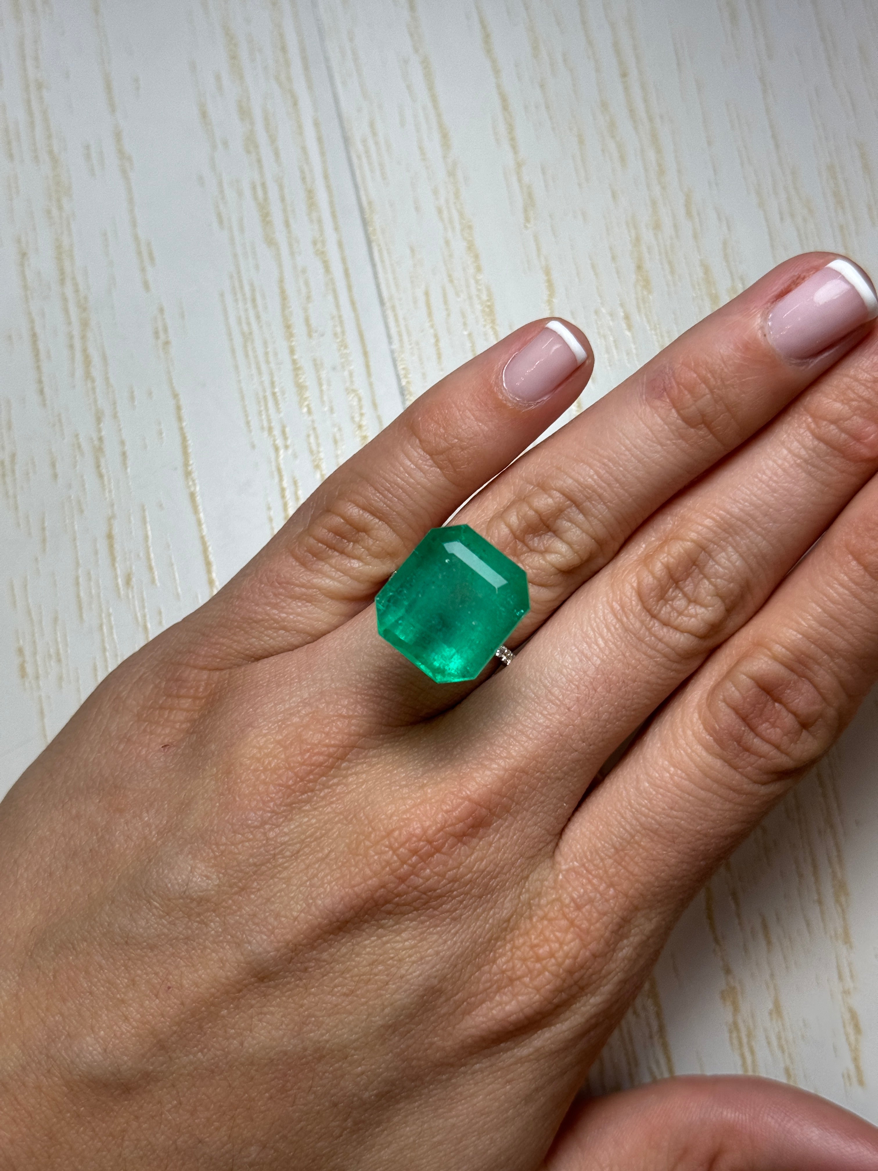 Large 23.85 Carat Colombian Emerald loose gemstone, classic emerald cut, natural green color, from JR Colombian Emeralds.