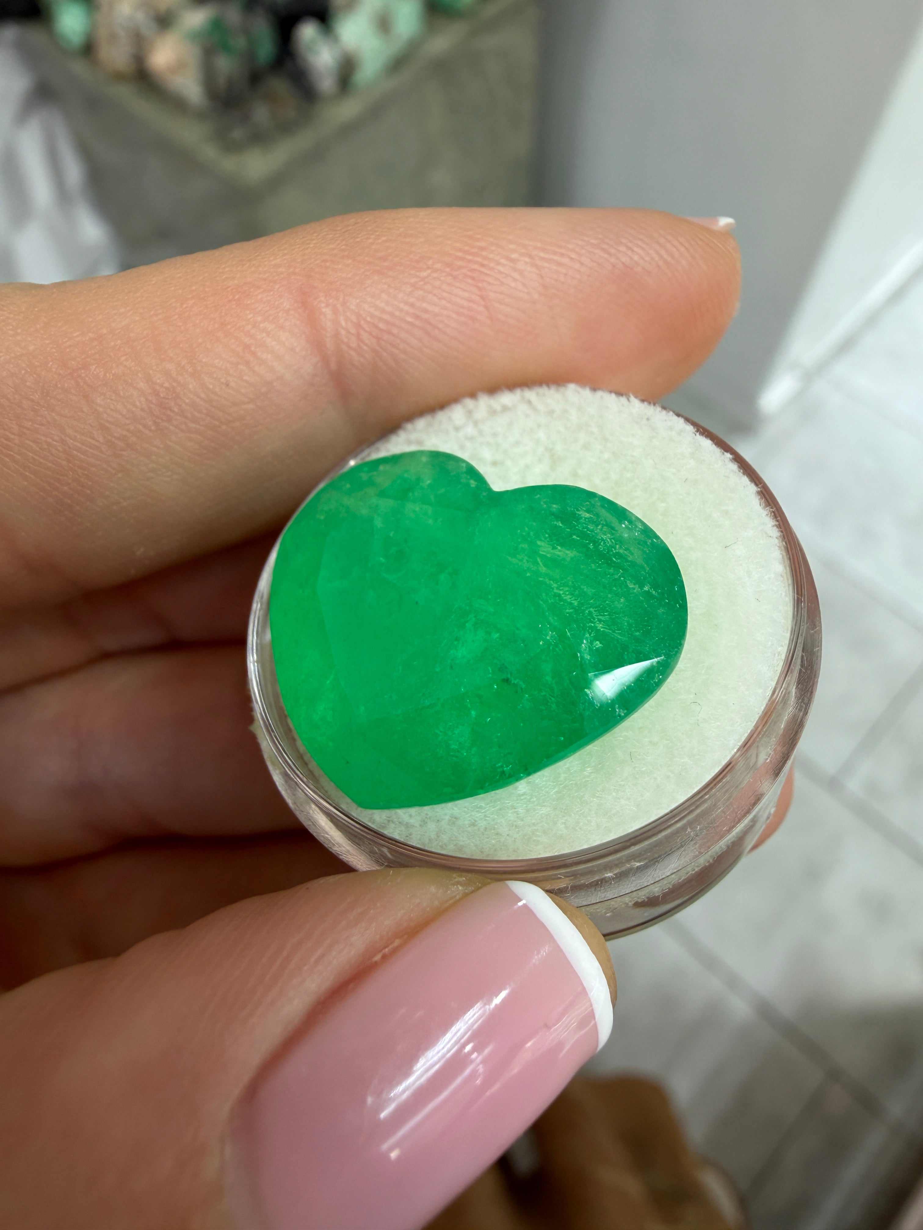 Large 23.97 carat bright green natural Colombian emerald in heart cut, loose gemstone, from JR Colombian Emeralds.