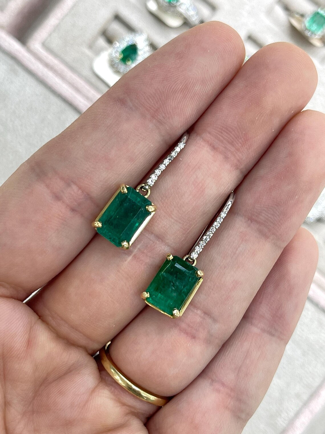 JR Colombian Emeralds earrings with 8.32tcw emerald dangle features, diamonds, and leverback hooks, showcasing elegant jewelry design.
