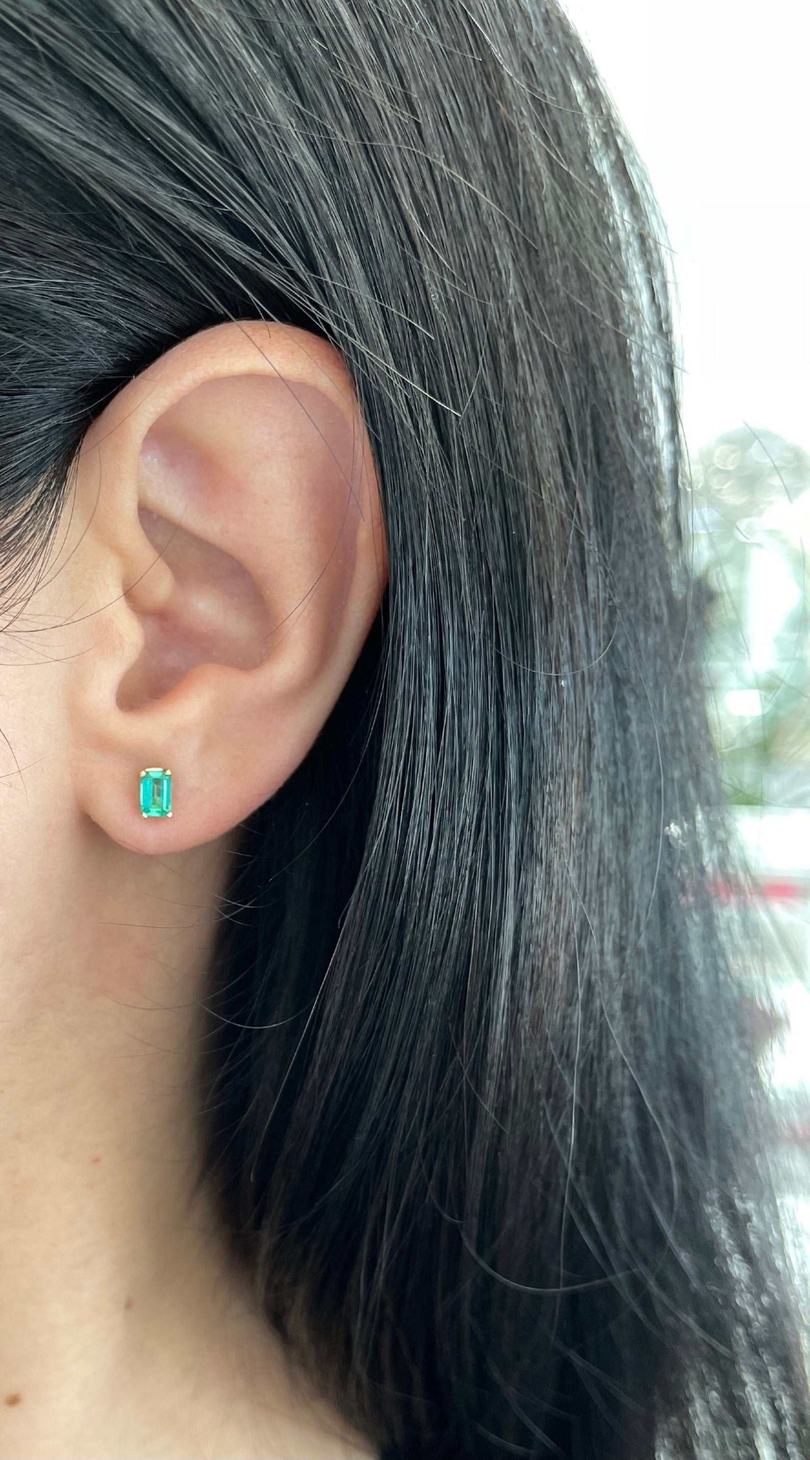 14K yellow gold emerald cut stud earrings with 0.80tcw diamonds, featuring a dainty four-prong classic setting by JR Colombian Emeralds.