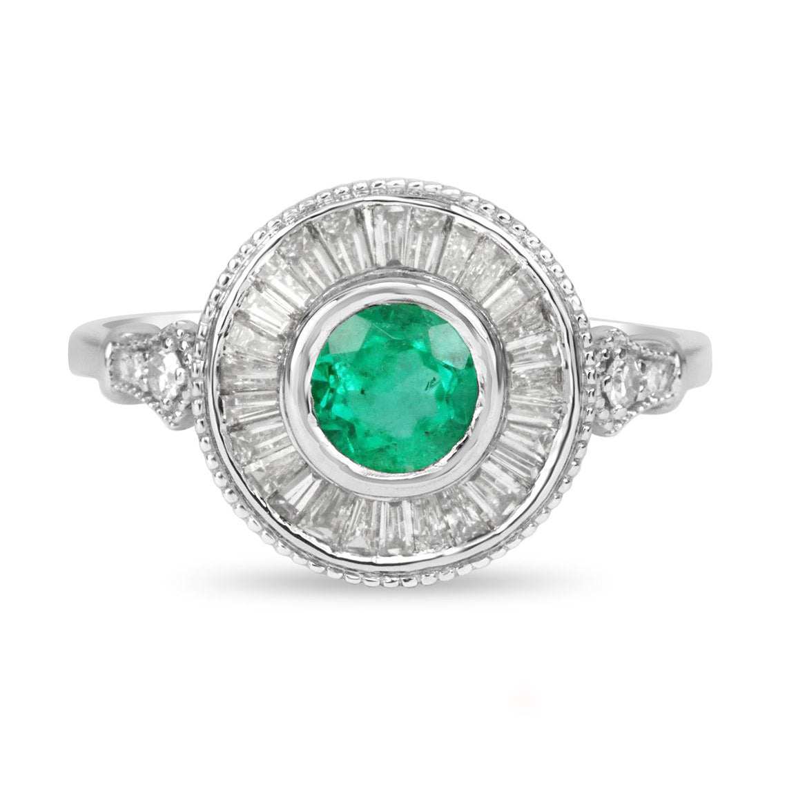 1.25tcw Colombian emerald and diamond baguette halo ring in 14K white gold.
