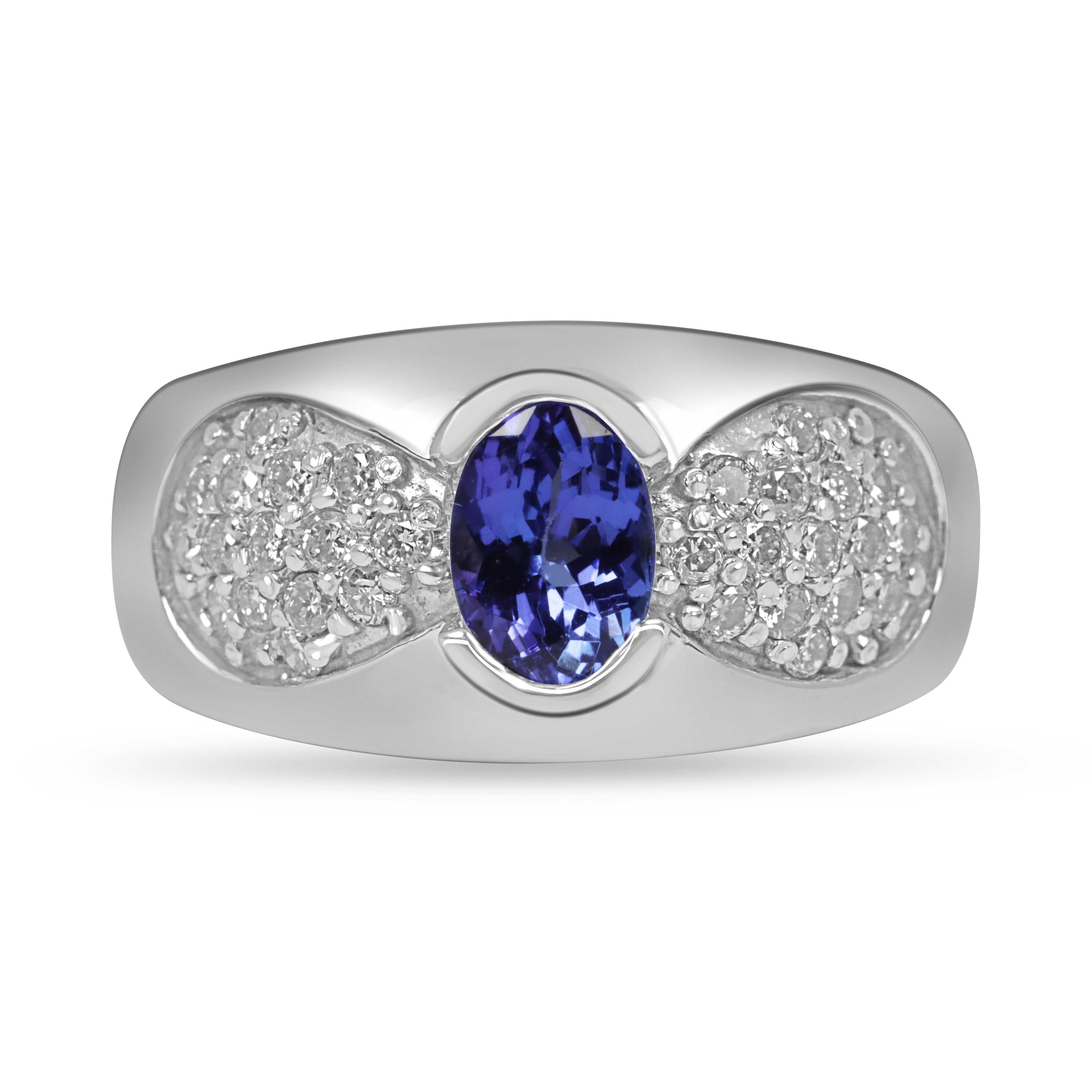 1.70tcw natural tanzanite and diamond band ring in 14K white gold with oval blue-lavender tanzanite center and pavé diamond accents