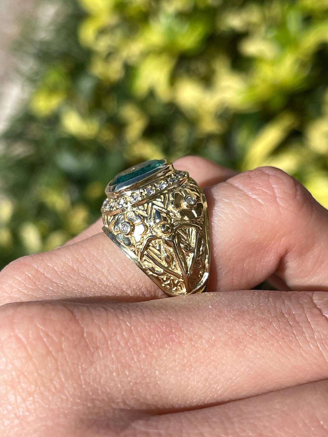 3.23ct Floral Oval Emerald Features Diamond Halo in Bold Statement Ring