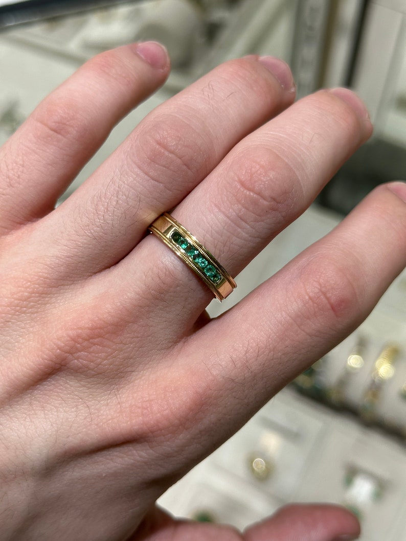 Medium green round cut men's emerald ring in 14K gold by JR Colombian Emeralds, unisex band with 0.40ctw emerald center.