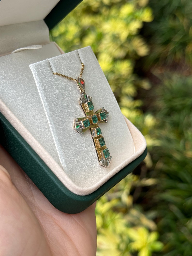 Unisex emerald cross pendant with 2.55ctw natural Colombian emeralds, 18K two-toned yellow and white gold, jewelry accessory.
