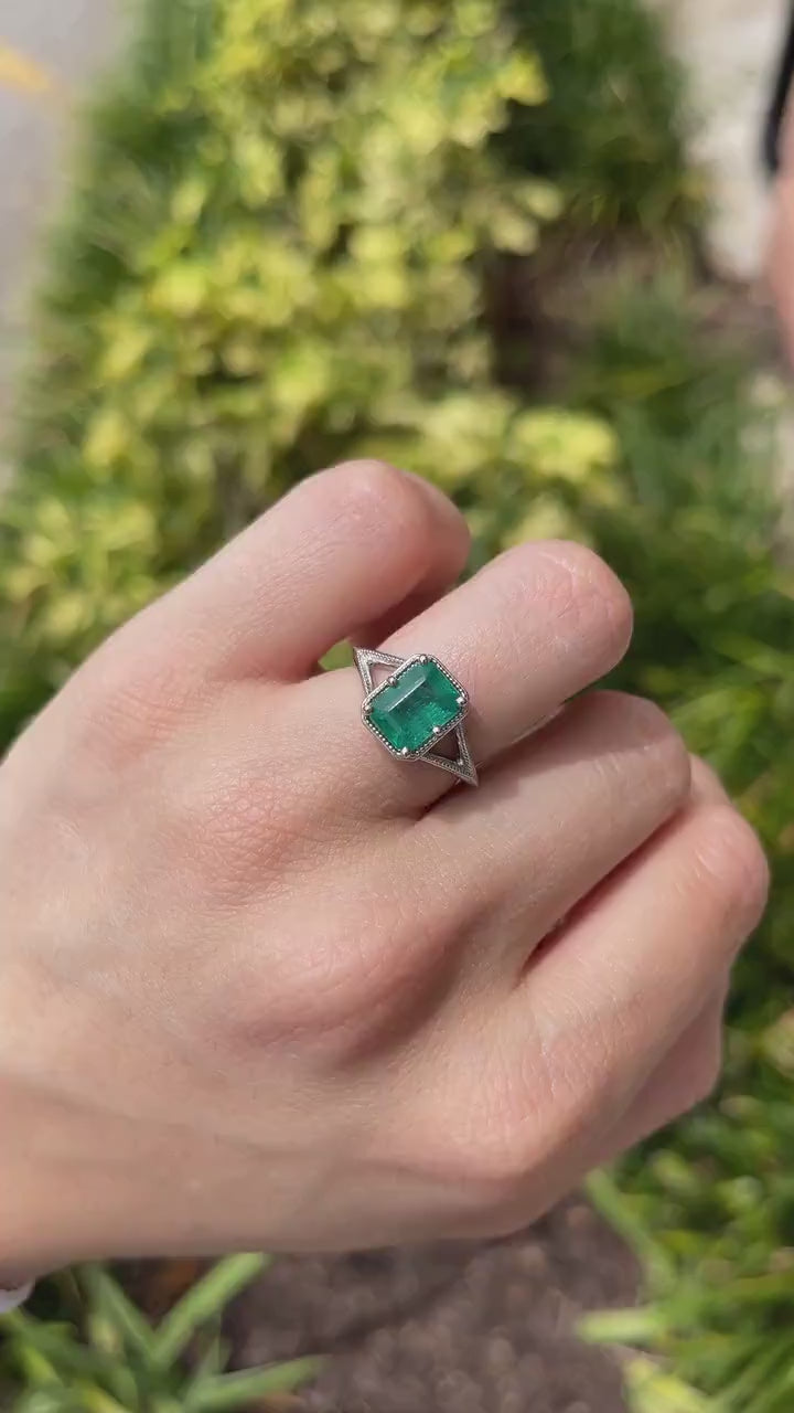Elegant 2.22ct Emerald Cut Bluish Green Solitaire Ring Crafted in Platinum