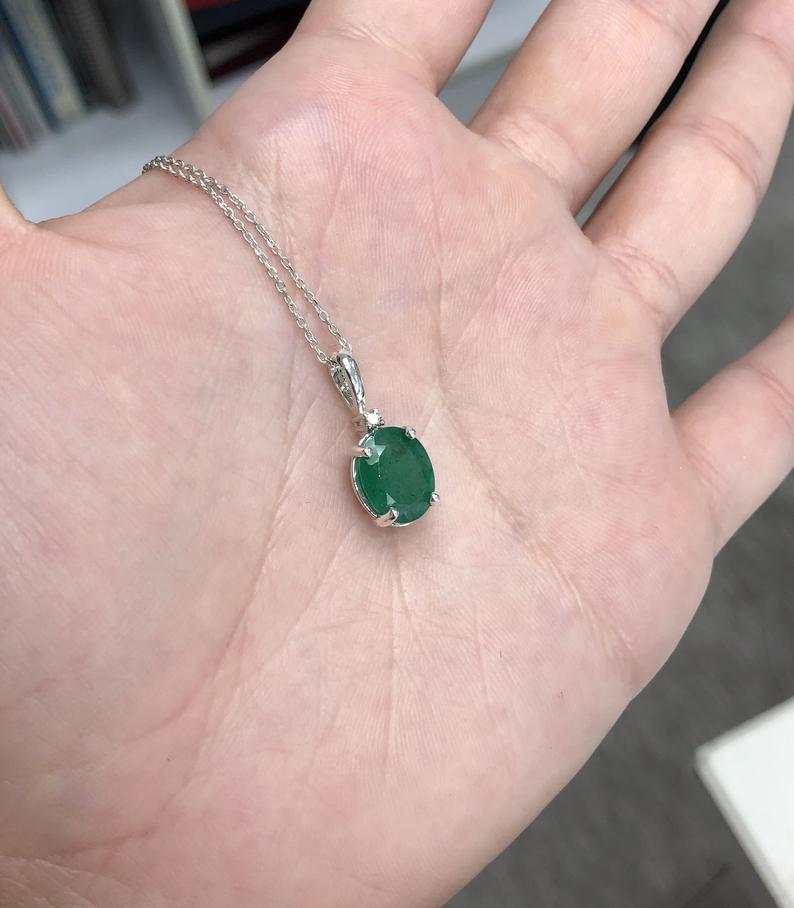 2.69 Carat Dark Green Emerald Oval and diamond Accent Silver 4 prong Necklace