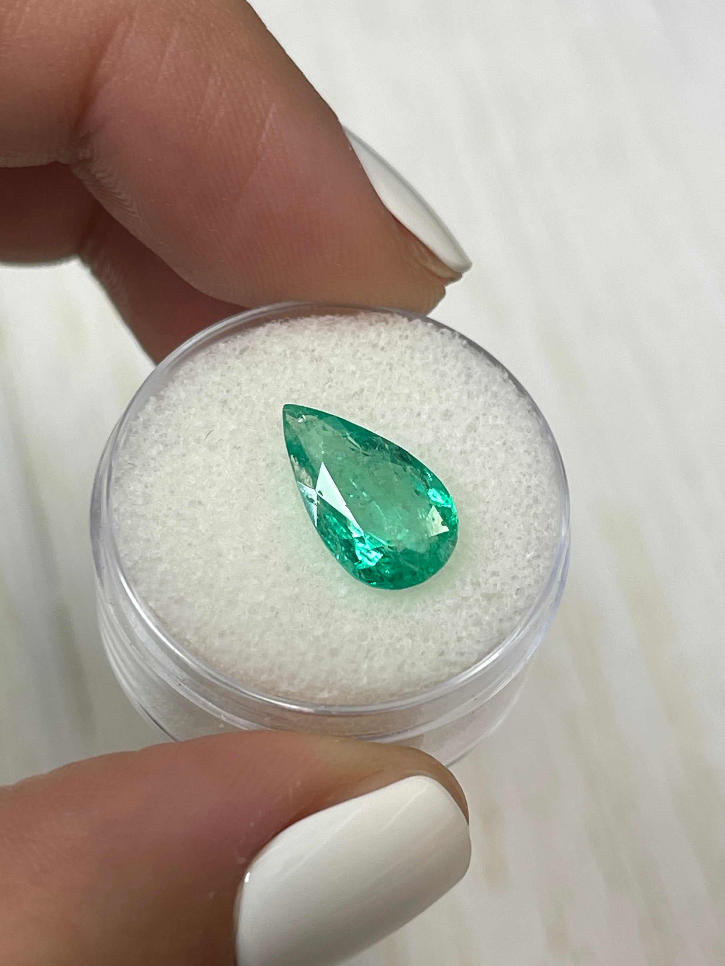 Natural 2.61 carat Colombian emerald loose gemstone, pear cut, bright green color, from JR Colombian Emeralds.