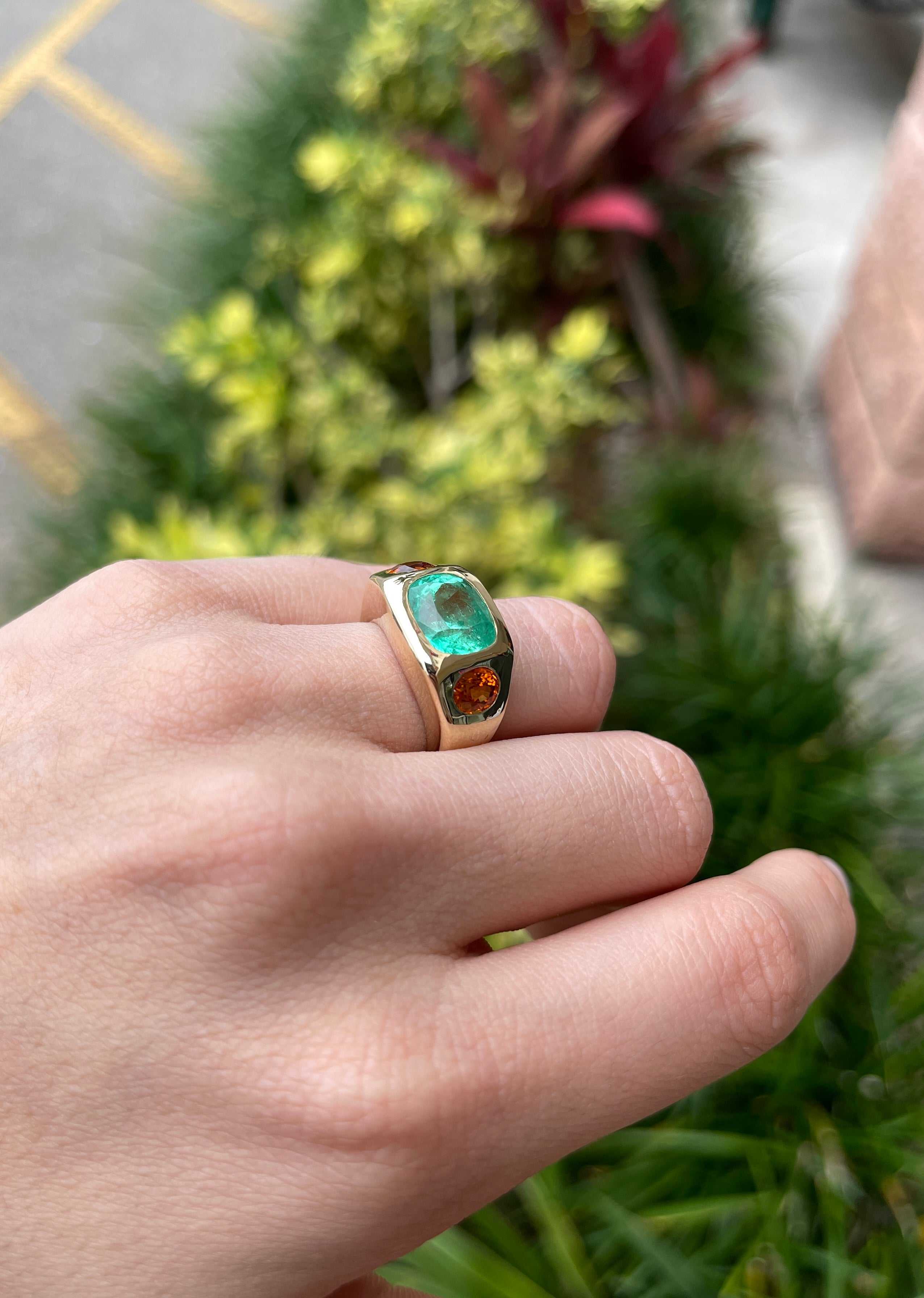 7.05tcw 14K Three Stone Large Cushion Cut Emerald & Oval Orange Sapphire Gypsy Ring present