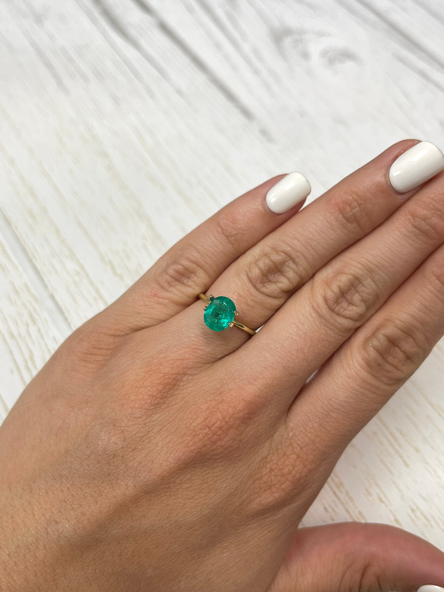 A Stunning Bluish Green Oval Colombian Emerald, 60 Carats, 9x7.3mm