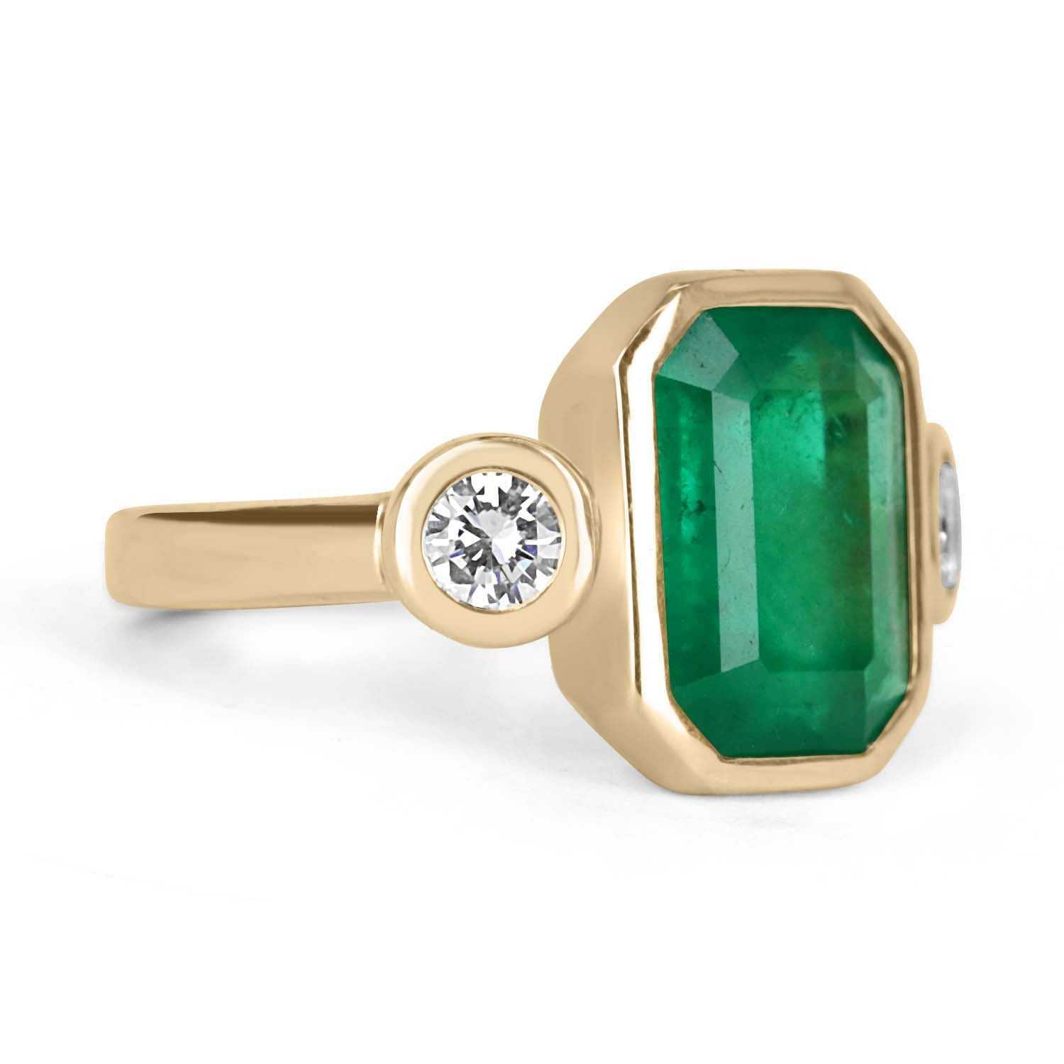 elegant three stone dark green emerald and diamond ring 18K