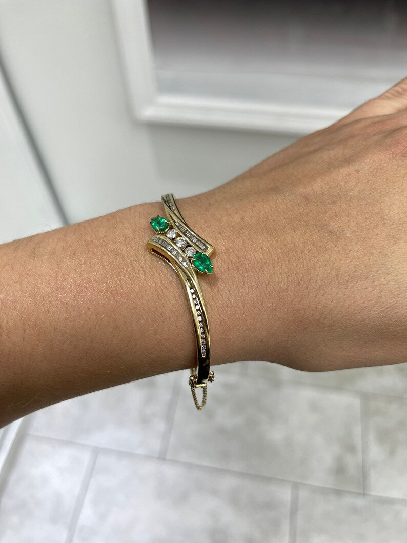 14K yellowish green emerald bangle bracelet with round cut emerald and triple diamond accents, Colombian Emerald jewelry.