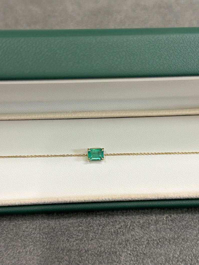 Colombian Emerald 1.0 Carat rich green natural emerald solitaire bracelet with claw prong setting in 14K gold.