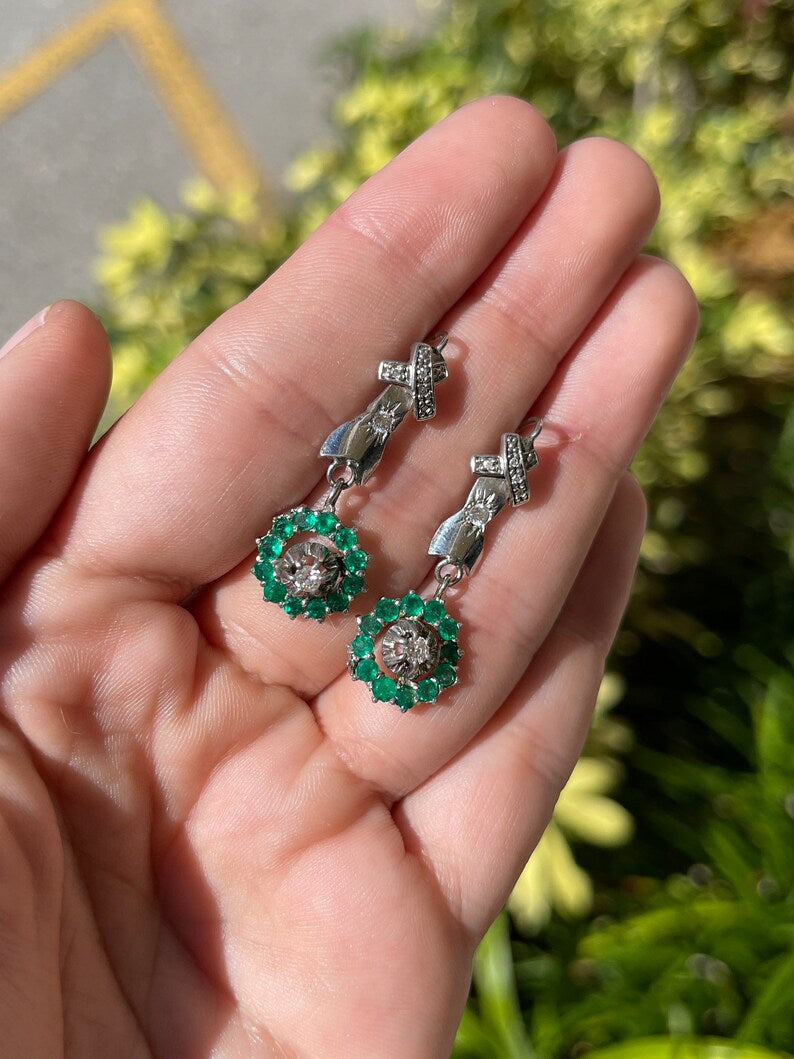 Vintage 14K green Colombian emerald dangle earrings with diamond accents and halo design, perfect for anniversary jewelry.