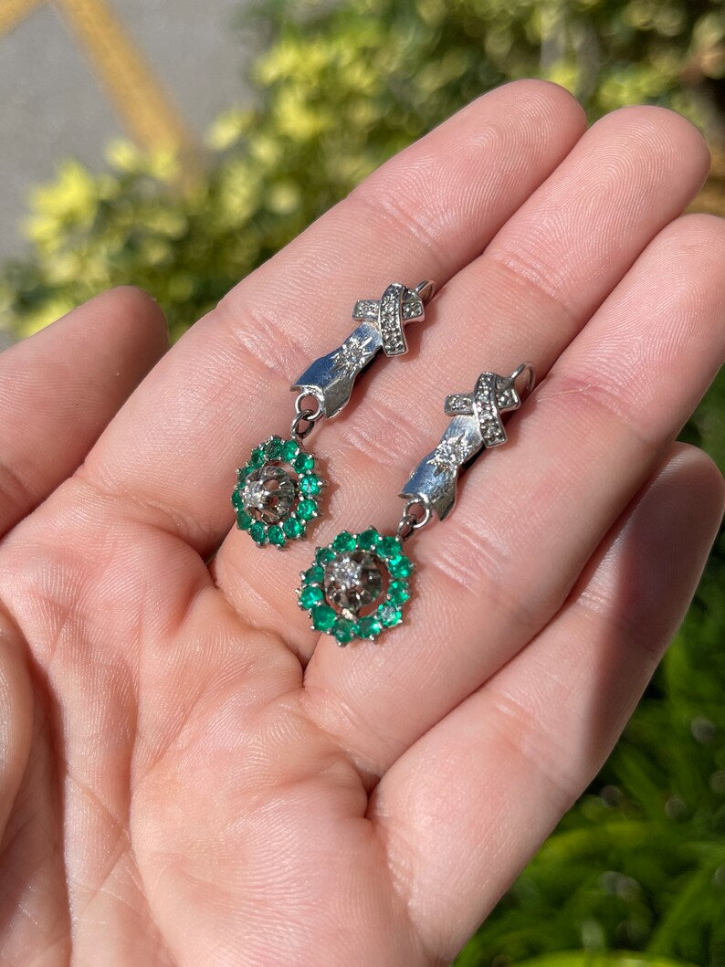 Vintage 14K green Colombian emerald and diamond halo dangle earrings with round stones for anniversary wear.