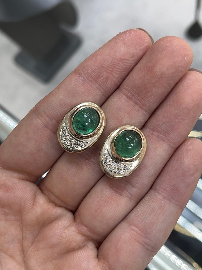 14K yellow gold emerald cabochon and diamond accent clip-on earrings by Colombian Emerald, showcasing elegant gemstone details.