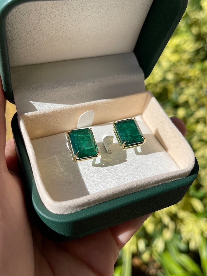 18K gold emerald stud earrings featuring large AAA Colombian emeralds with a statement heirloom design.