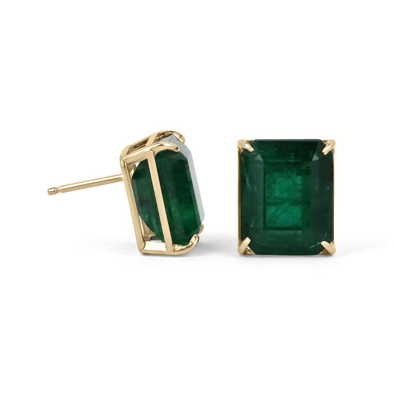 Large 18K gold earrings with 18.04 carats of AAA Colombian emeralds, featuring statement stud design and heirloom quality.