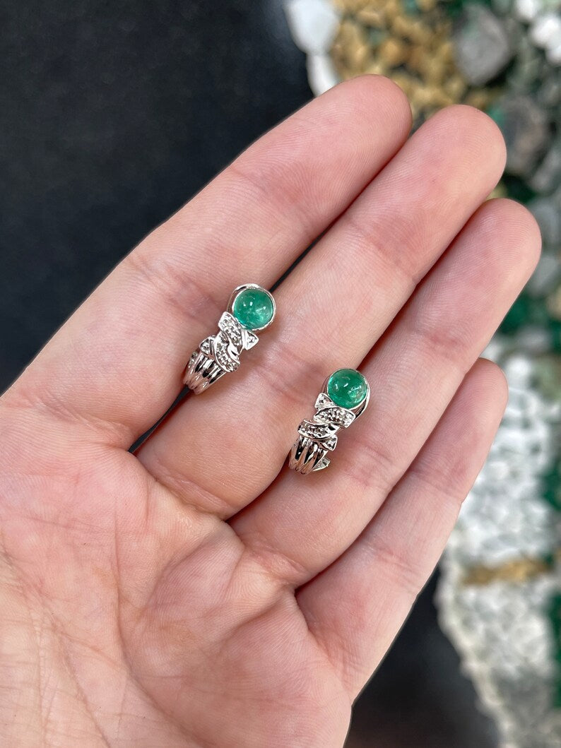 Colombian Emerald 14K gold drop earrings with cabochon-cut emeralds and diamond accents on omega hooks, elegant jewelry accessory.