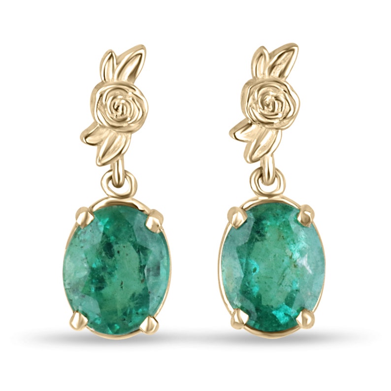 Colombian Emerald 14K gold dangle earrings with oval cut green and rose natural emeralds featuring floral design.