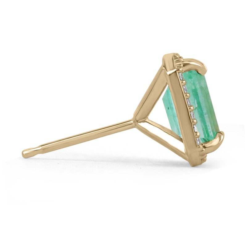 14K gold diamond halo stud earrings featuring 2.10 carats of natural emerald cut diamonds by Colombian Emerald.