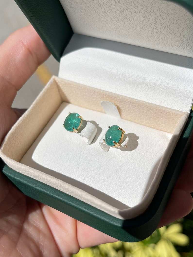 Colombian Emerald earrings with 4.34tcw oval cut deep bluish green natural emeralds in 14K solitaire stud design