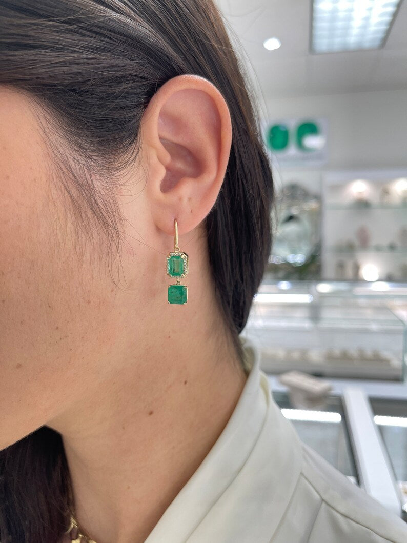 Colombian Emerald and diamond halo dangle drop earrings in 14K gold with 7.39tcw natural emeralds and sparkling diamonds