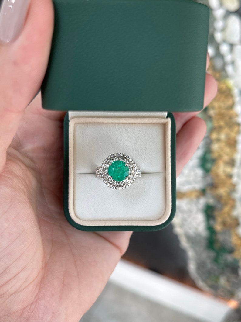 Colombian Emerald 14K white gold engagement ring with round emerald center and double diamond halo, 3.52 tcw.