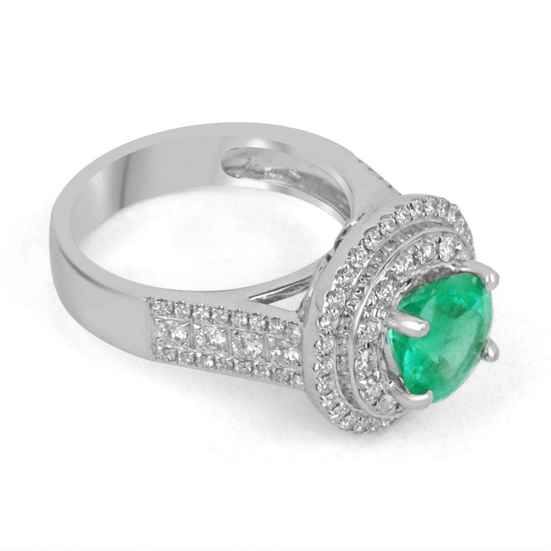 Colombian Emerald engagement ring with 3.52tcw round emerald center, double diamond halo, 14K white gold setting.