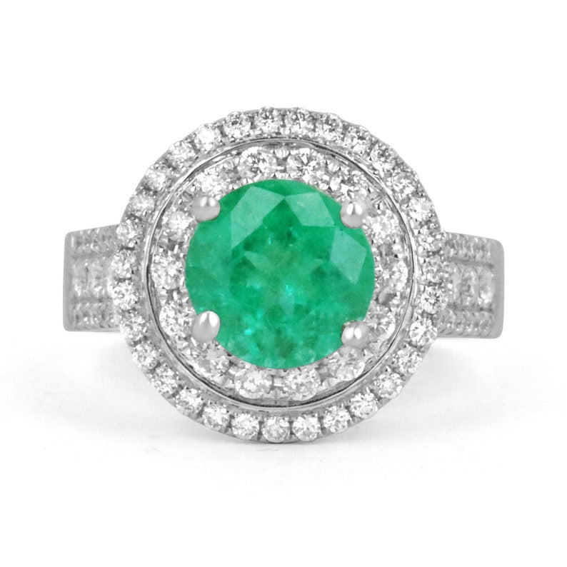 Colombian Emerald and diamond halo engagement ring in 14K white gold with 3.52tcw round emerald center stone.