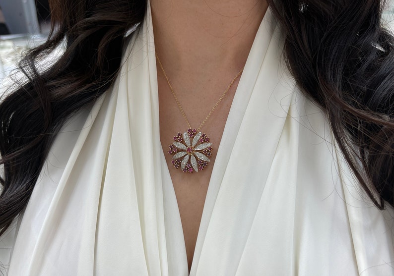 Vintage 1980s Victorian-style brooch with Colombian emeralds, rubies, and diamonds in solid 14K gold setting.