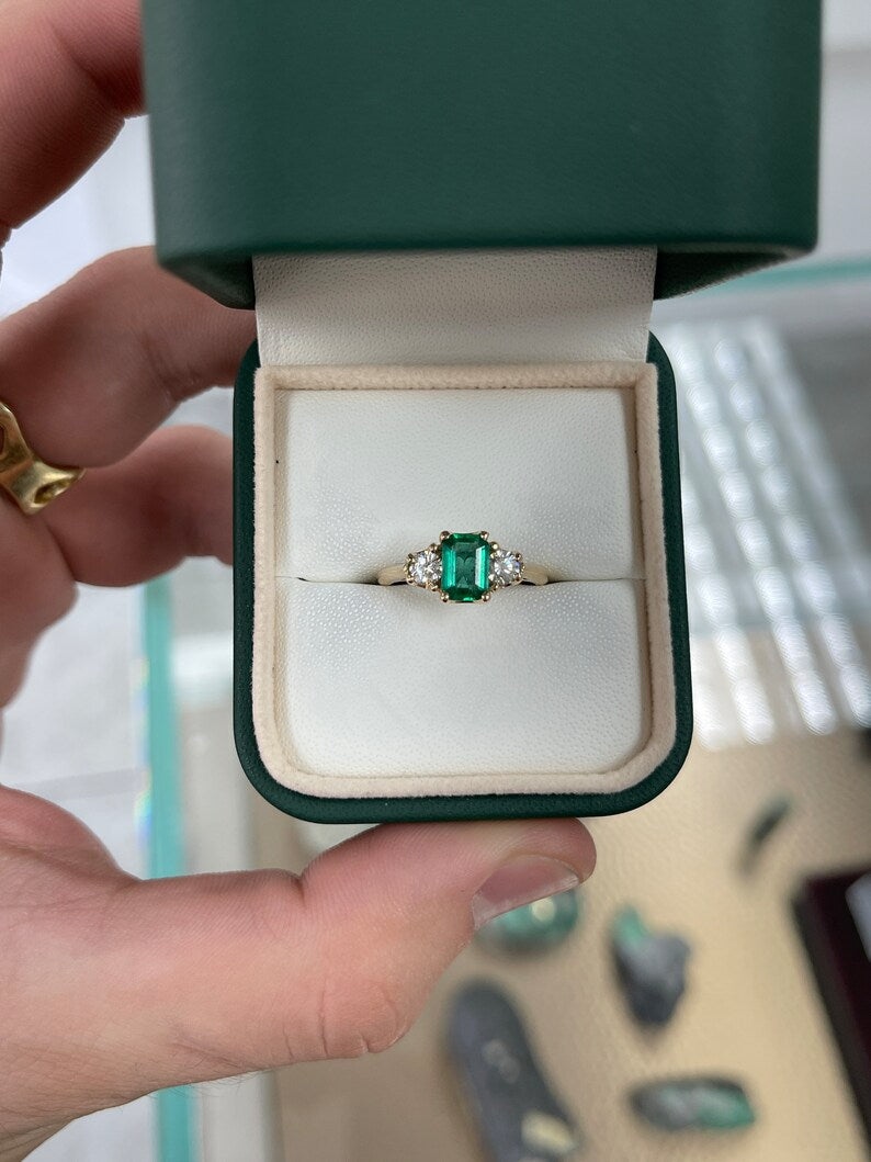 Dark bluish-green emerald and round diamonds 3-stone engagement ring in 14K gold by Colombian Emerald.