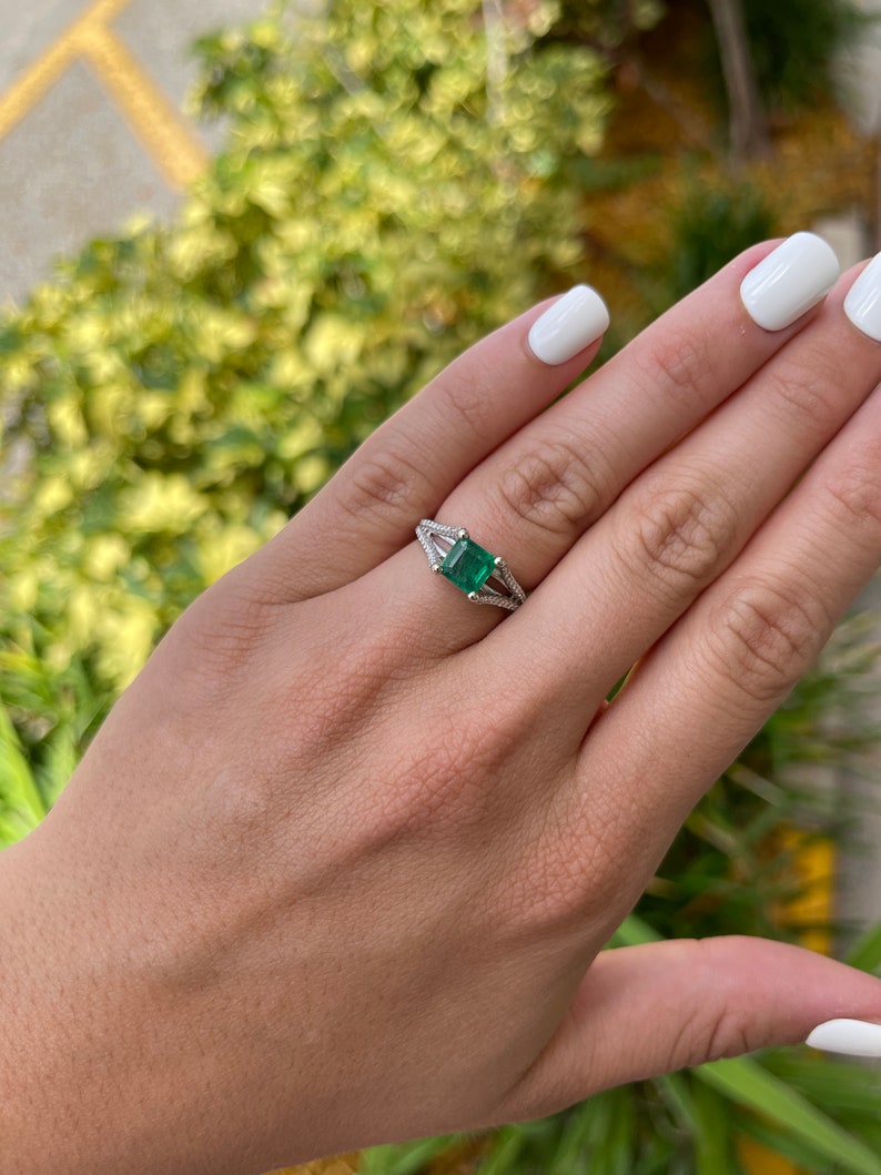 Dark vivid green emerald and diamond split shank engagement ring with 1.66 tcw in 14K gold, featuring an Asscher cut emerald.