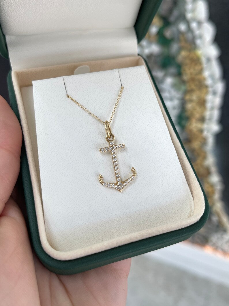 14K gold ocean lover necklace with 0.45tcw iced out anchor cut pave diamonds, Colombian Emerald gemstone pendant.