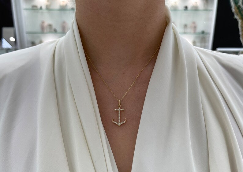 14K gold ocean lover necklace with 0.45tcw iced out anchor cut pave diamonds, Colombian Emerald gemstone pendant.