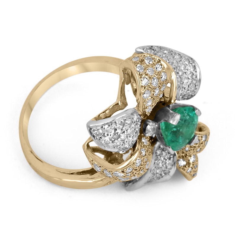 Ladies Colombian Emerald and diamond leaf cluster cocktail ring with 1.75tcw 14K gold, featuring round cut emeralds and floral design.