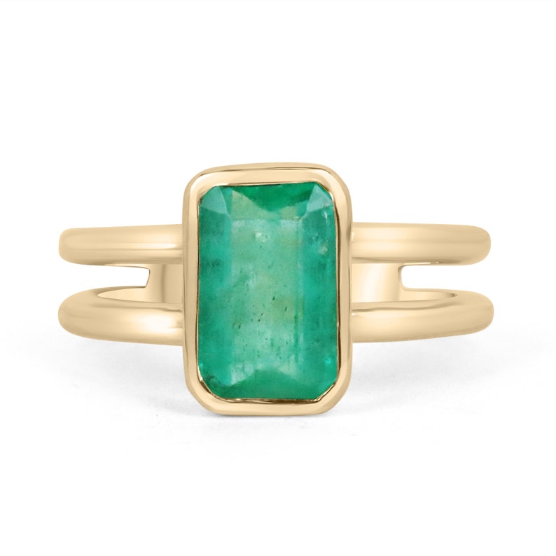 Colombian Emerald Ladies Ring with 2.05ct vivid green emerald cut solitaire in 14K gold with split shank design for right hand.