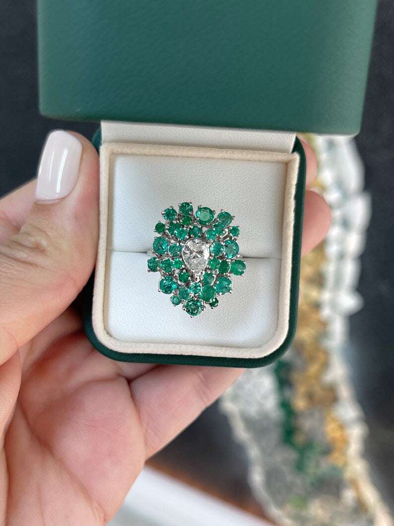 14K white gold ladies teardrop diamond and emerald cluster ring with Colombian emerald accents, statement jewelry piece.