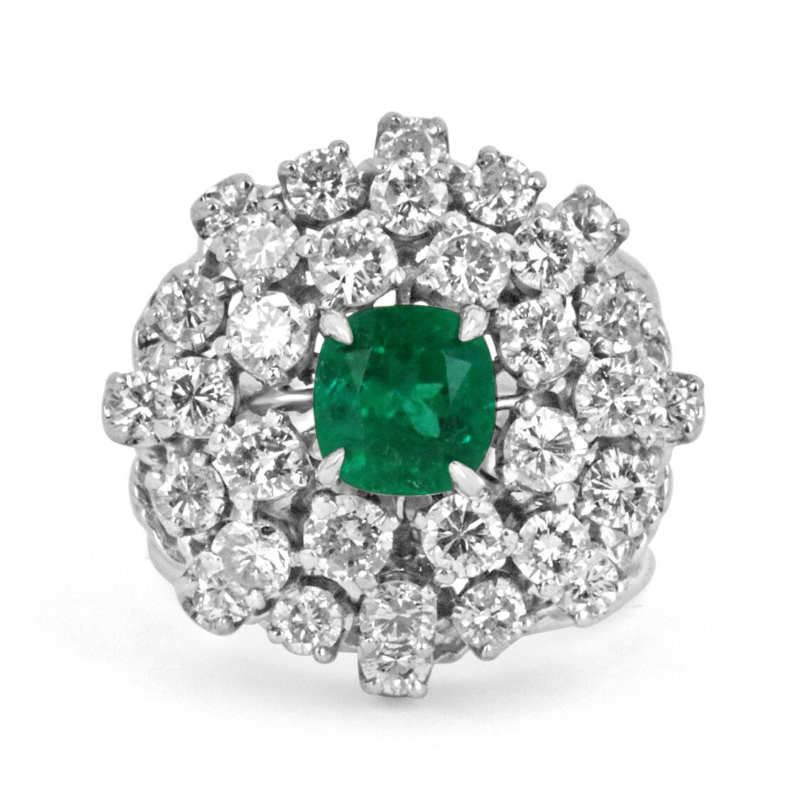 Colombian Emerald vintage cocktail ring featuring a cushion-cut emerald with diamond accents in white gold for ladies.