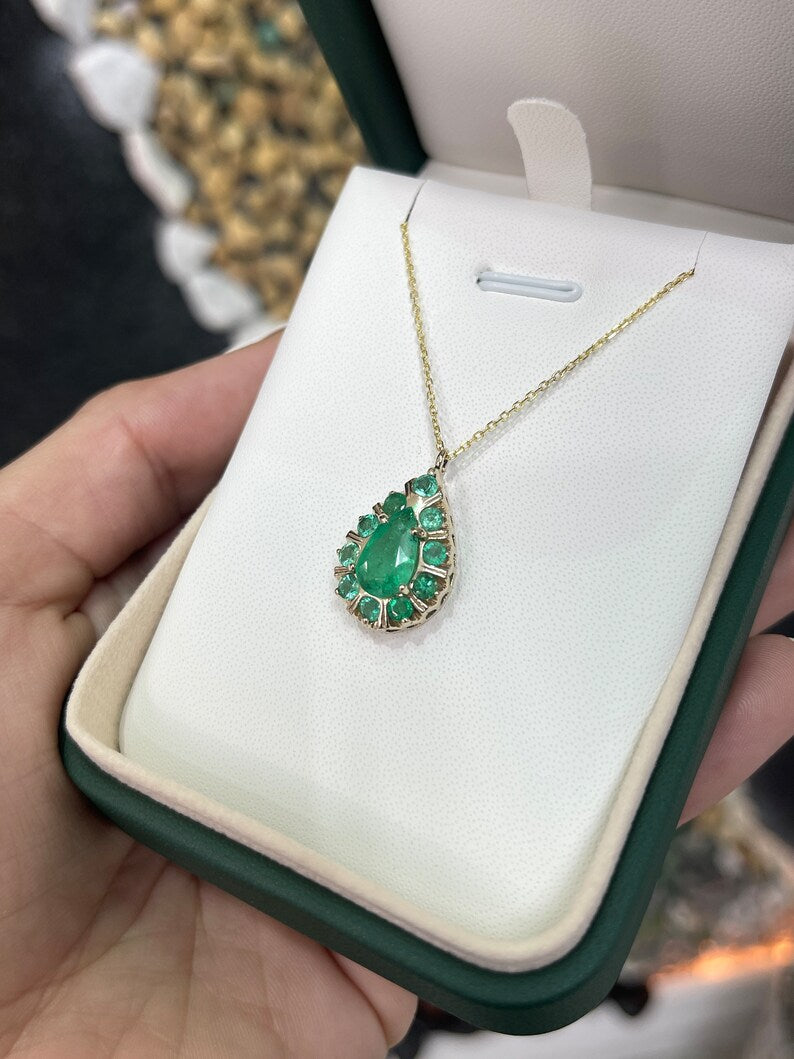 14K gold pendant necklace with natural emerald, pear and round cut multi-gemstones, Colombian Emerald brand, prong setting.