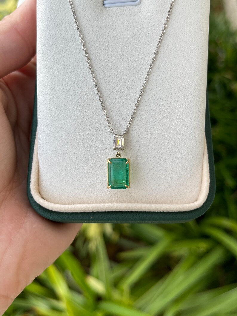 Genuine dark green emerald cut diamond pendant on two-tone gold necklace, Colombian Emerald brand jewelry.