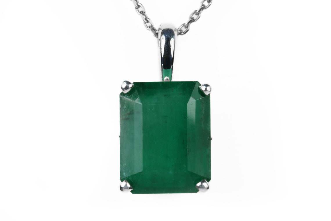 4.30 carat dark green large emerald sterling silver necklace, emerald cut, four-prong setting.