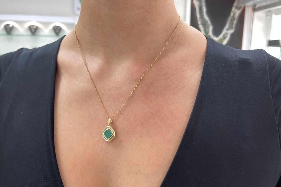 14K gold pendant featuring a 2.30ct natural emerald-asscher cut solitaire gemstone with geometric design, unisex jewelry by Colombian Emerald.