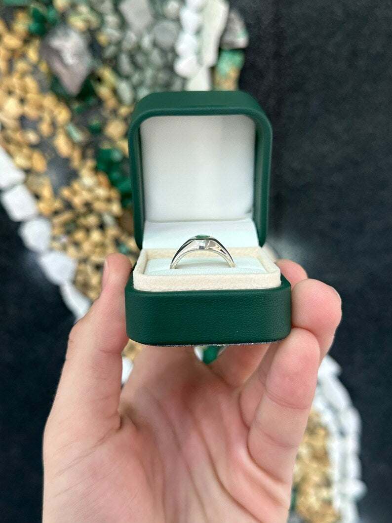 Sterling silver men's pinky ring with 0.60ct round cut emerald solitaire from Colombian Emerald brand.