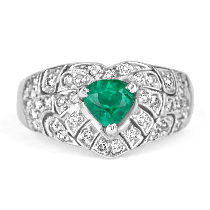 14K Colombian Emerald trilliant cut and diamond cluster statement ring with 0.90tcw, featuring vibrant green emeralds and sparkling diamonds.